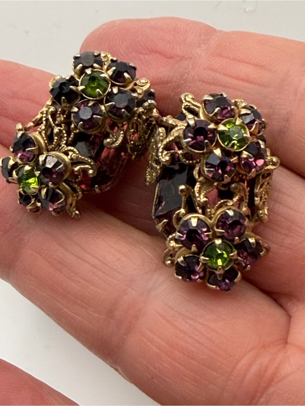 Vintage 1950’s purple and olivine rhinestone floral clip earrings
